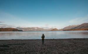 man stands in beach