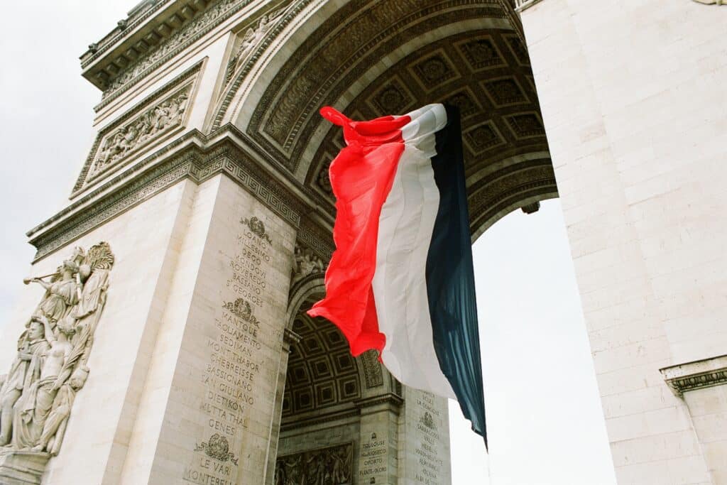 multicolored flag near building