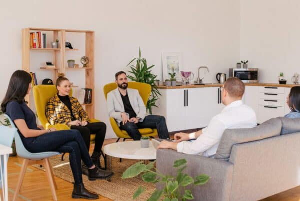people seated in living room